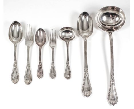 A Victorian silver part table service, the shaped and moulded handles with oval bead mounts and engraved with monogram, by Jo