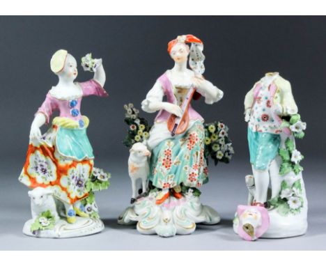 Three 18th Century "patch mark" Derby porcelain figures - lady with lute, 7.25ins, girl with posy, 6.75ins and man with dog, 