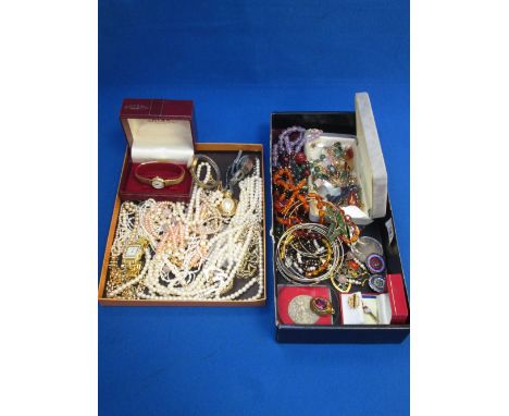 Two boxes of costume jewellery including simulated pearls, bead necklaces, Rotary watch, earrings etc