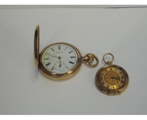 A small yellow metal key wound pocket watch stamped 18K having a Roman numeral dial and extensive decoration to case, and a g