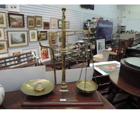 An early/mid 20th century Berry & Warmington set of brass scales with weights