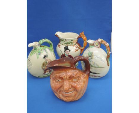 A Fieldings Crown Devon John Peel hunting jug, two Crown Devon flasks, Auld Lang Syne and Daisy Bell (all missing musical ins