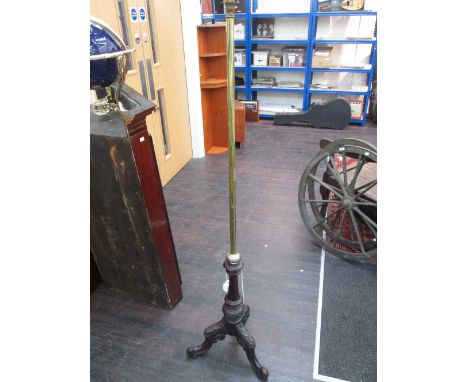 A late Victorian stained framed torchere/standard lamp with brass column