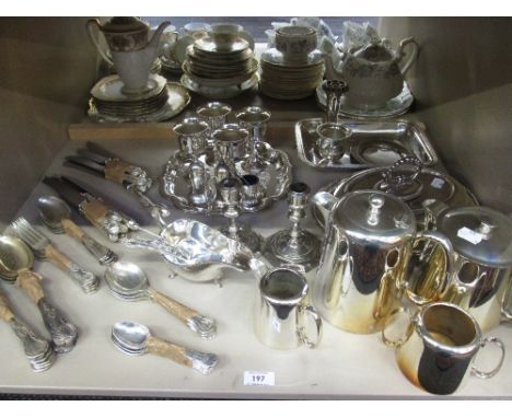 A selection of silver plate including four piece tea set, Kings Pattern flatware, candlesticks, sauce boat, goblets etc