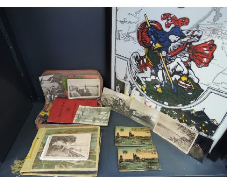 A selection of militaria, relating to the military career of Clifford Jessup, including 50th anniversary framed tapestry and 