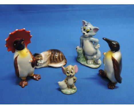 Two Beswick studies, Pengiun with Umbrella 802, Pengiun with Walking stick 803, two Wade studies, Tom and Jerry and a Royal D