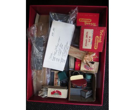 A selection of Triang and Wardie OO gauge accessories including gents toilet, coal bunker set, milk churns, ticket office etc