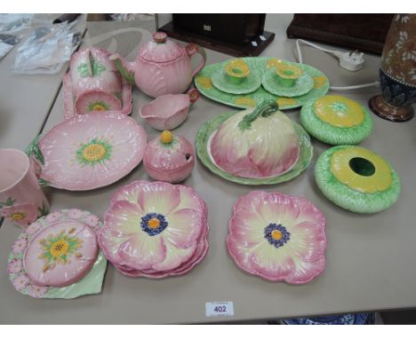 A selection of Carltonware pink leaf ware including teapot, cheese dish and similar leaf ware including Beswick Gardena plate