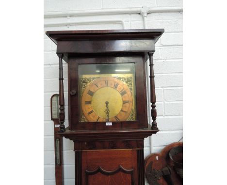 A late 18th/early 19th century oak and mahogany longcase clock, having square pillar hood, containing replacement brass face 