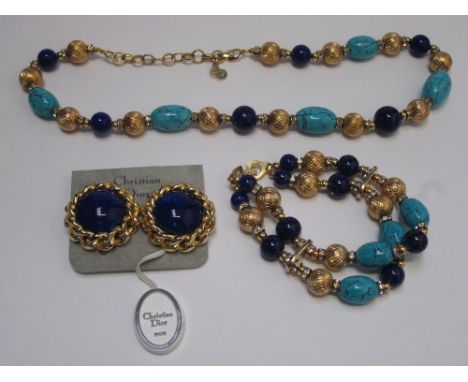 A 1980's necklace and bracelet by Christian Dior having turquoise and lapis lazuli style beads with diamante spacers, with ma