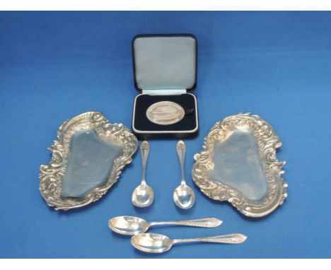 A small selection of HM silver including 4 teaspoons, a commemorative British Midlands Airways 40th anniversary crown and two