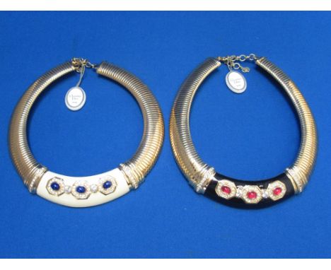 A 1980's necklace by Christian Dior having a cream enamel panel with blue paste & diamante decoration on a snake link chain, 