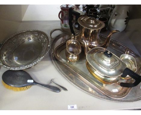 An HM silver dressing table brush having engine turned decoration, HM silver baby's pusher and a selection  of plated ware in