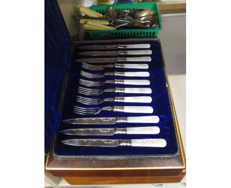 A selection of plated and other flatware including a cased set of fruit knives and forks having mother of pearl handles, case