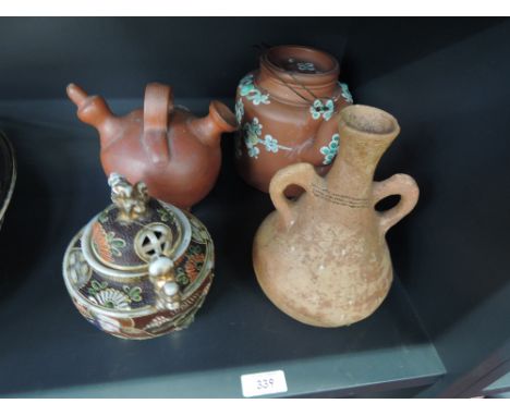 An red earthenware kettle of Chinese design having enamel decoration, an earthenware pot, an Antiquarian style vase and a Sat