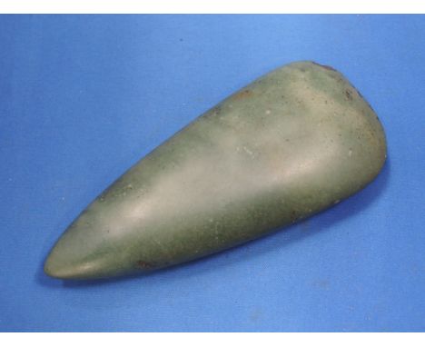 A Neolithic Jadeite polished axe, found in Wiltshire