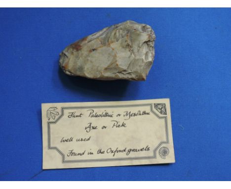 A Paleolithic/Mesolithic flint axe or pick, found in Oxford gravels