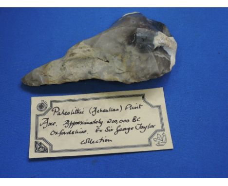 An Acheulian flint axe, approx 200,000 BC, Oxfordshire, from the collection of Sir George Taylor