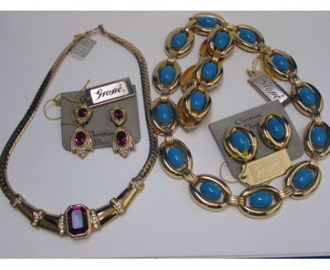 A 1980's three piece jewellery set by Grosse having turquoise paste decoration within open oval links, and a necklace by Chri