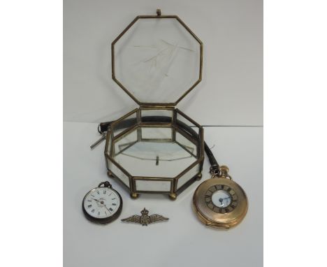 A white metal key wound pocket watch stamped 800 having Roman numeral dial to decorated enamel face within a foliate engraved