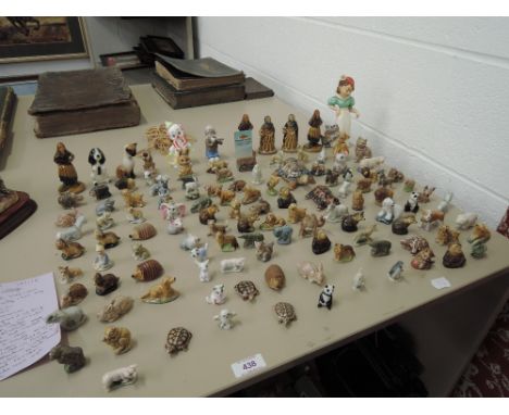 A selection of Wade and similar Whimsical figurines including Walt Disney