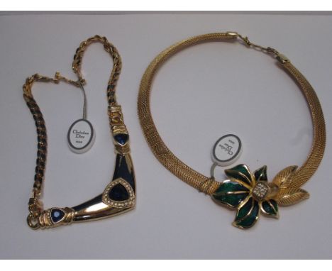A 1980's necklace by Christian Dior having enamel & diamante decoration on a plaited chain, with original tag and price label