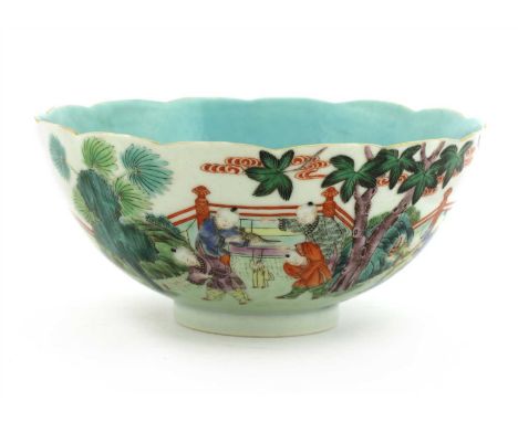A Chinese famille rose bowl, Jiaqing (1796-1820), 19th century, of lobed circular form, painted with boys playing various gam