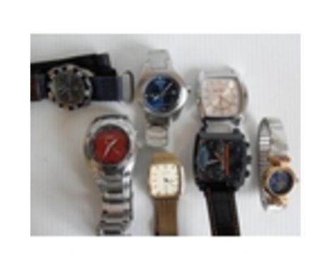 An assortment of gents' fashion watches to include: Tag Heuer Monaco Calibre 36 replica, Ben Sherman, Fossil,  Main, Yes, vin