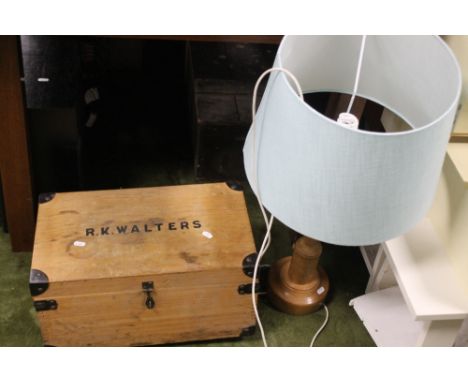 A PINE BOX TOGETHER WITH A TABLE LAMP