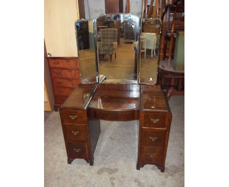A VINTAGE DRESSING TABLE WITH TRIPLE MIRROR