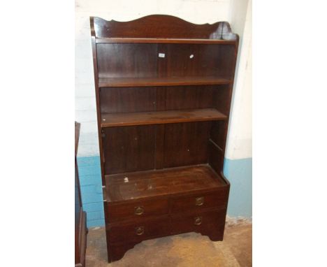 A VINTAGE BOOKSHELF DRESSER WITH DRAWERS