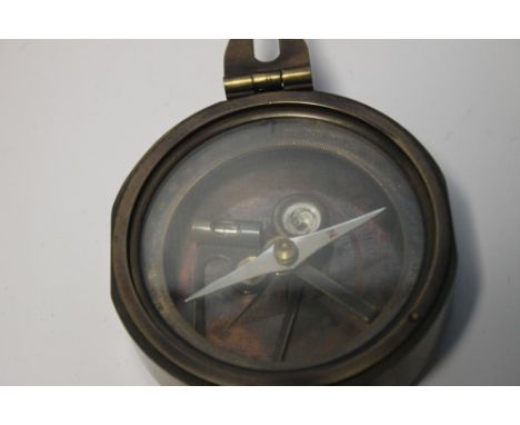 A REPRODUCTION BRINTON MILITARY COMPASS CONTAINED IN A TINTIN TIN