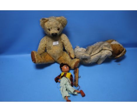 A VINTAGE PELHAM PUPPET OF A COWBOY in original box with instructions, a Chad Valley teddy bear, well loved and a pyjama case