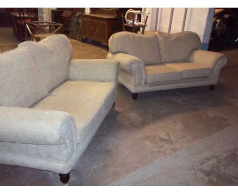 A THREE PIECE SUITE CONSISTING OF 2 X 2 SETTEE SOFAS AND A POUFFE WITH A KING SIZE HEADBOARD