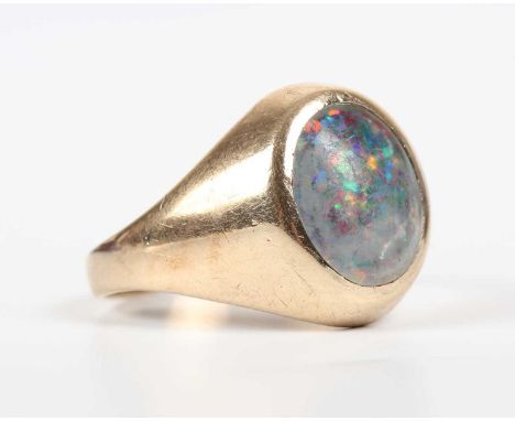 A 9ct gold ring, collet set with an oval opal triplet, Birmingham 1972, weight 4.5g, ring size approx S.