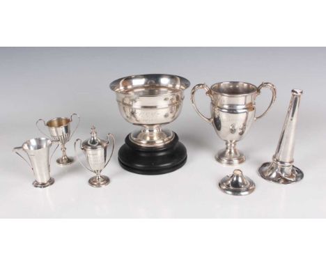 A George V silver trophy cup of ovoid form, inscription engraved 'F.C.C. Golfing Society. Shillaker Cup', flanked by two foli