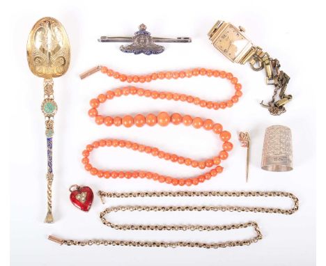 A small group of jewellery, including a gold, red enamelled and seed pearl heart shaped pendant, detailed ‘9ct’, length 2cm, 