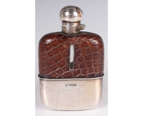 A George V silver mounted leather and cut glass hip flask with screw hinged lid and detachable cup, Sheffield 1925 by G. &amp