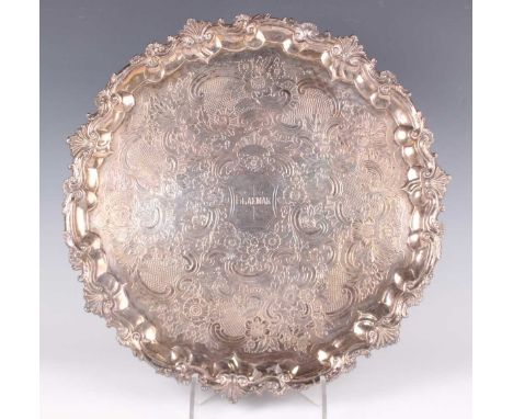 A George III silver circular salver, the centre inscribed 'Braemar' framed by engraved floral, scale and 'C' scroll decoratio