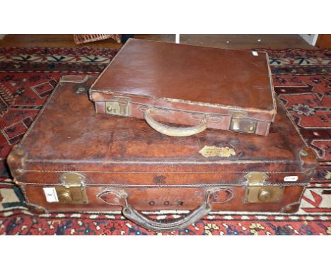 Small old leather suitcase with Royal Automobile Club label attached, and a similar attaché case