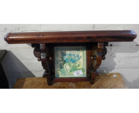 Mahogany wall clock bracket with inset tile