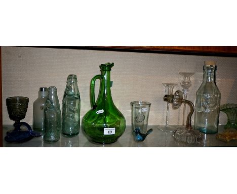 Shelf of retro glassware, candle holders, etc.