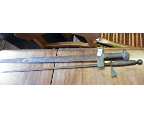 Sudanese sword with brass handle, no scabbard and rust to blade and a Continental toledo-type sword, rust to blade
