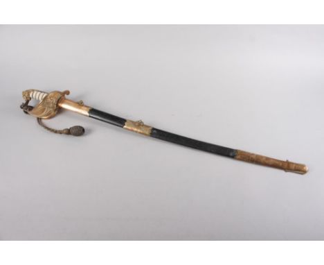 An early 20th century 1827 pattern naval dress sword with knot and scabbard, formerly the property of Cdr "Johnny" Manwaring 