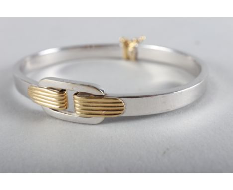 An Italian 18ct white gold bangle with yellow gold details, 15.6g 