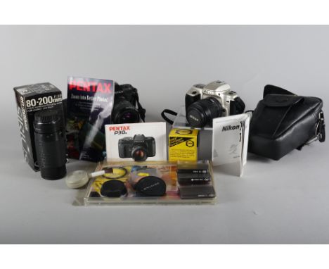 A Pentax P30N camera, a Nikon F50 camera, a Sirius 80-200mm lens and other camera accessories 