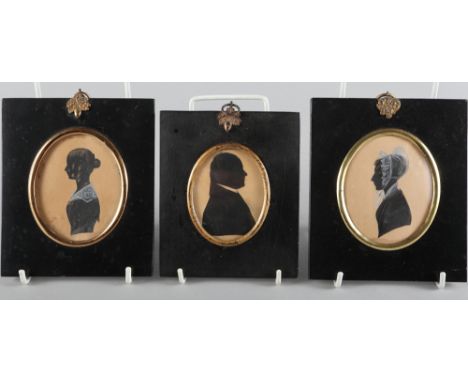 A 19th century portrait silhouette, pen and ink of William Bird, and two similar portraits of women 