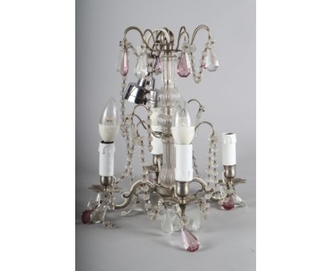 A glass and metal framed four-light chandelier, hung pink glass drops and beads, 16" high 
