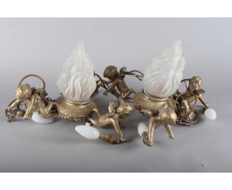 A pair of gilt metal four-light cherub ceiling lights with flambe frosted shades, 14" wide 