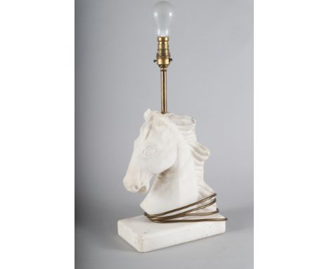 A white marble table lamp, formed as a horse's head, on rectangular base, 17 1/2" high overall (damages to ear), an Agfa "Opt